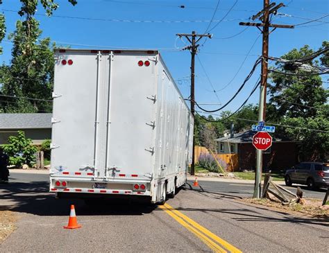 Truck hits utility pole in Arvada knocking out power and traffic lights